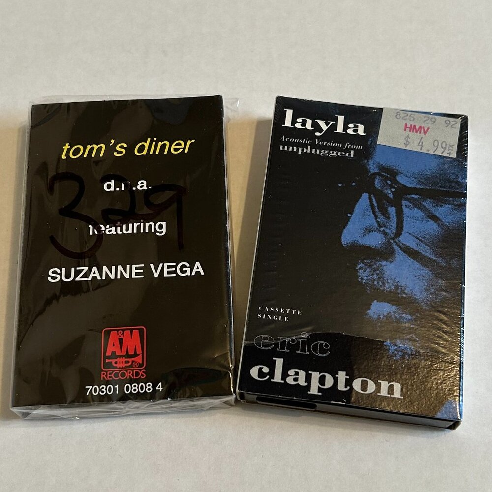 Cassette singles for Eric Clapton and Suzanne Vega